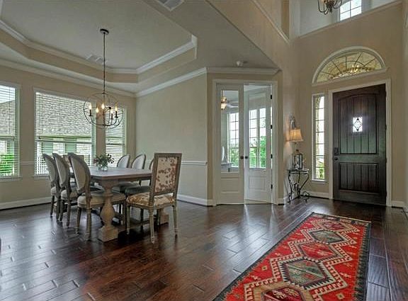 Formal dining room is perfect for family dinners or holiday parties.