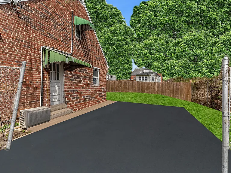 Extra wide driveway holds 4-6 cars depending upon car size