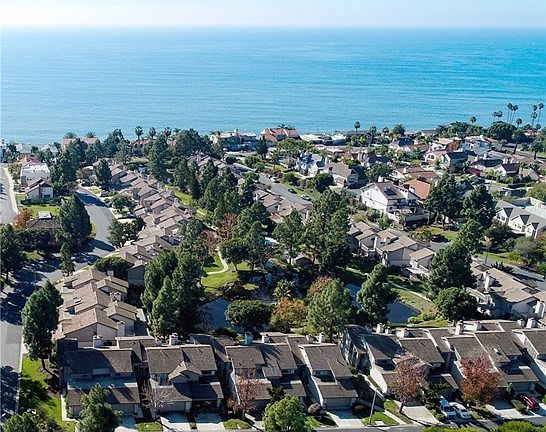 Aerial shot of Old Mill Pond's 58 units, up on the bluff with a view of the proximity to the Pacific ocean.