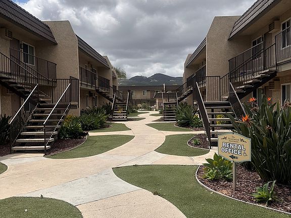 Walkway between buildings at The Meadowlark Apartments in San Marcos, CA.