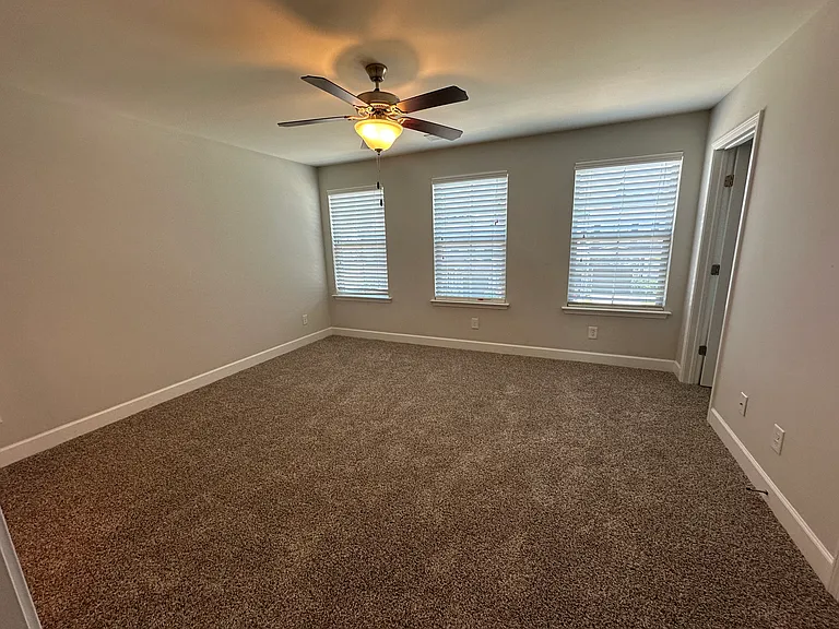 Main bed with walk-in closet and attached bathroom