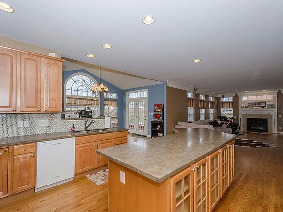 Kitchen with 42 inch cabinets hardwood floors