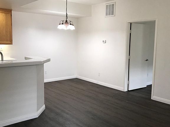 Dining area, door to bedroom 2