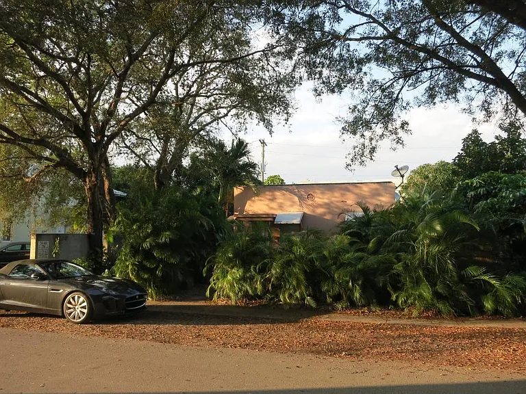 Your own private walled encircled and gated home in Central Coral Gables