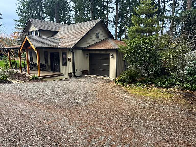 Additional view of garage exterior with convenient parking access.