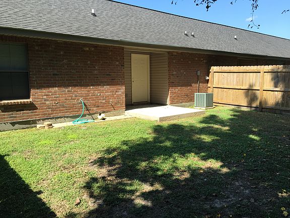 Private fenced-in backyard