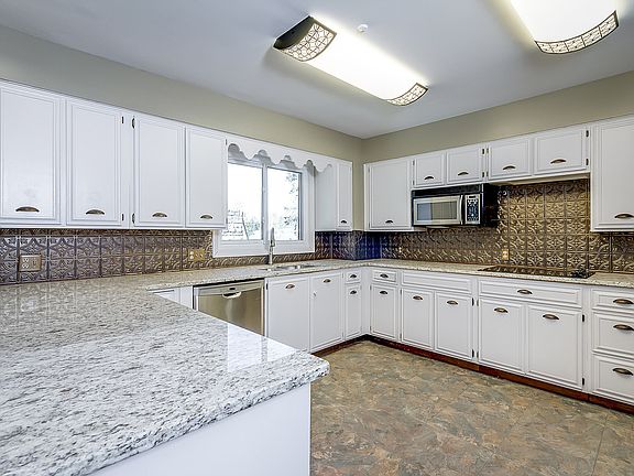 2nd image of 11859 Woodbridge Ln NW