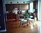 Large Updated Kitchen with Slab Granite Counter, Cherry Cabs and Floors