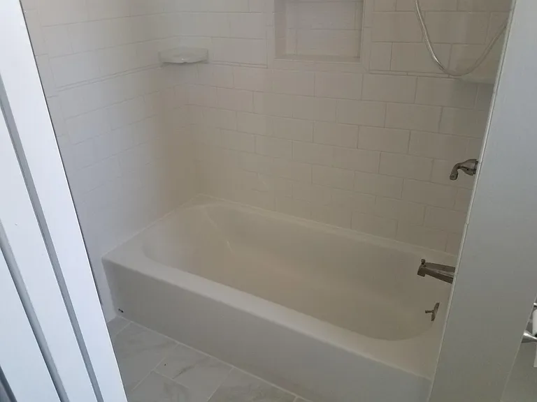 Brand new tub and tile