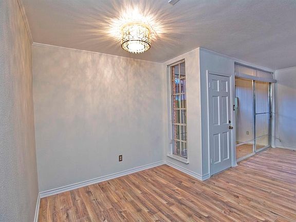 10x10 Dining Room - Dining room with window, entry door and patio door provide a cheery welcome for all who enter.