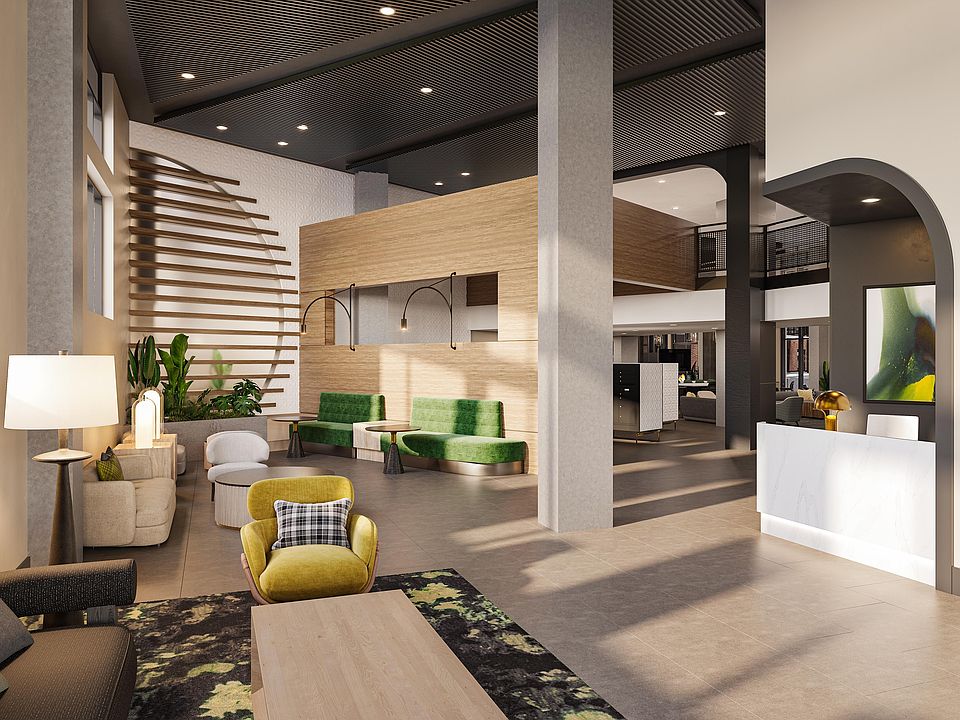 Hotel-inspired lobby with lounge seating at Modera H Street in Washington, D.C.