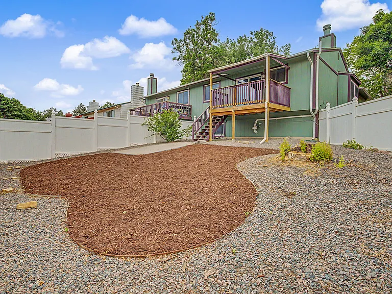 Low maintenance backyard space - private fence
