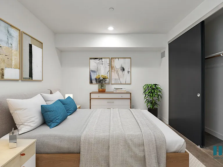 Bedroom with Recessed Lighting, Concrete Flooring, and Closet