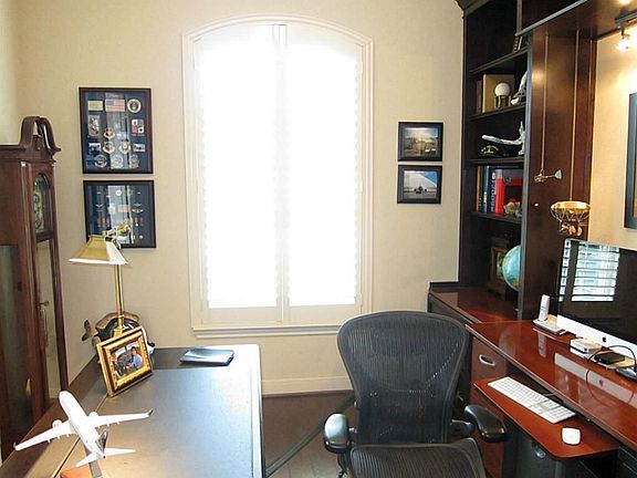 STUDY IN FRONT OF HOME WITH CUSTOM BUILT INS