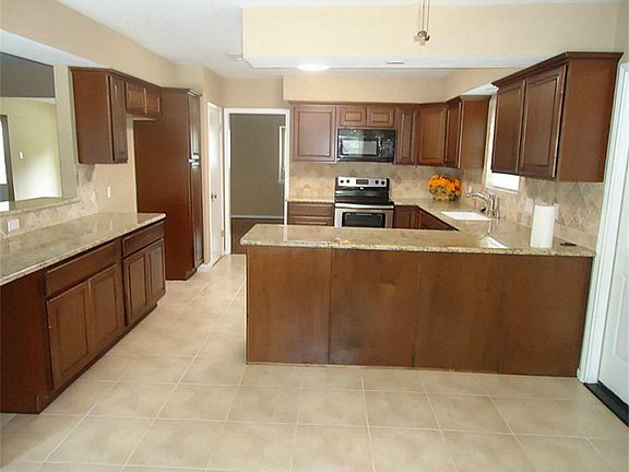 SPACIOUS KITCHEN/DINING ROOM AREA. GREAT FOR ENTERTAINING