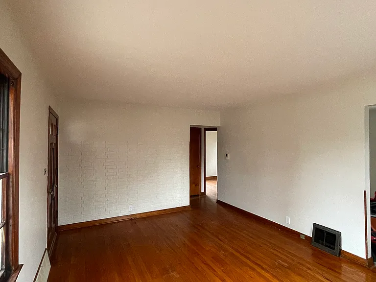 Living Room - Newly refreshed hardwood floors and freshly painted