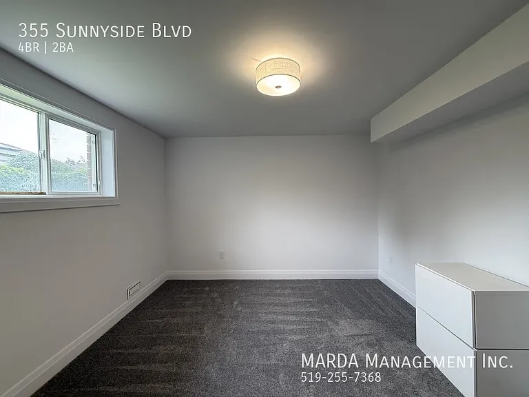 355 Sunnyside Blvd — Photo 51