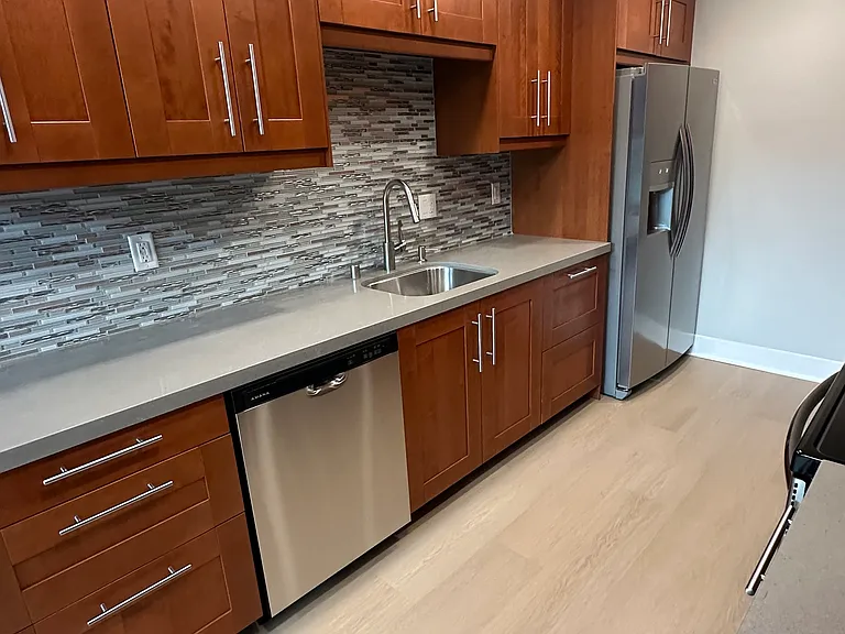 Huge Galley Kitchen Tons of Counter Space. Fridge has Water and Ice in Door.