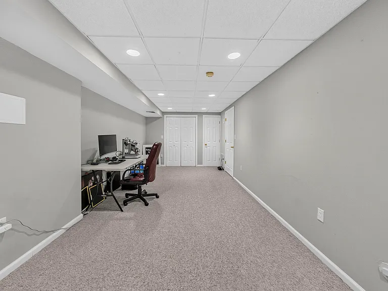 Versatile Bonus Room with Recessed Lighting and Ample Closet Space