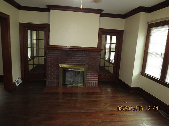Fireplace and Den or Office through doors behind