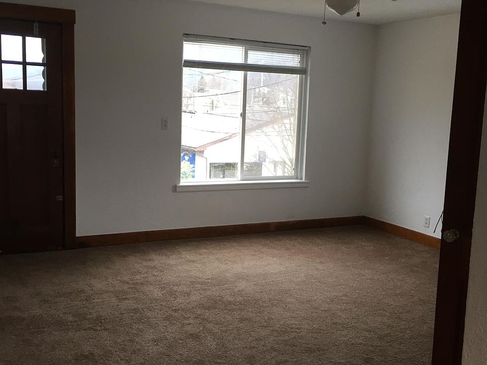Living room with access to balcony.
