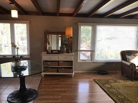 Dining area between kitchen and living room