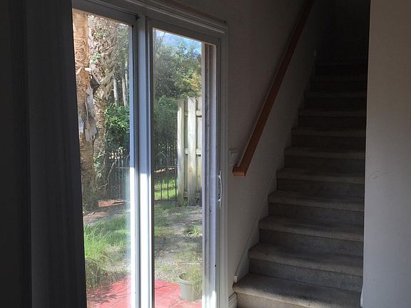 Sliding Glass Doors with Rear Patio and Stairs