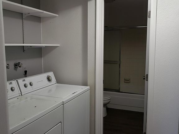 Laundry room / hallway leading to bathroom