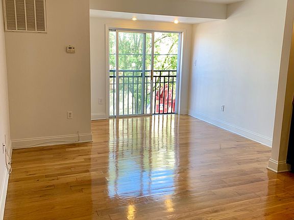 View from the front door. Bathroom and bedroom to the left. Open concept kitchen on the right.
