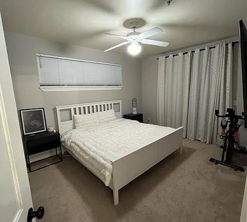 Primary bedroom (king size bed for reference), has sliding glass door that leads out to balcony. Has ensuite bathroom and double closets.