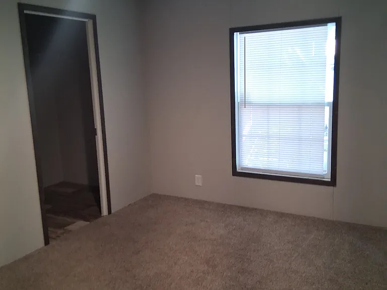 Carpeted bedrooms throughout - in the Primary bedroom the large size also comes with a large closet and double sink bathroom.