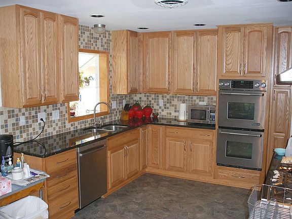 new kitchen; oak, granite, stainless steel