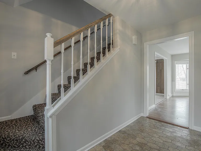 Head upstairs for the master suite and bedrooms.