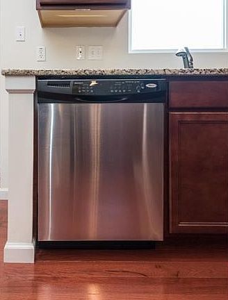 The dishwasher is convenient to the sink, breakfast room, and the commune island.