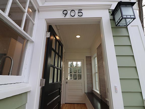 Mudroom entry from drive way looking through to door accessing rear deck