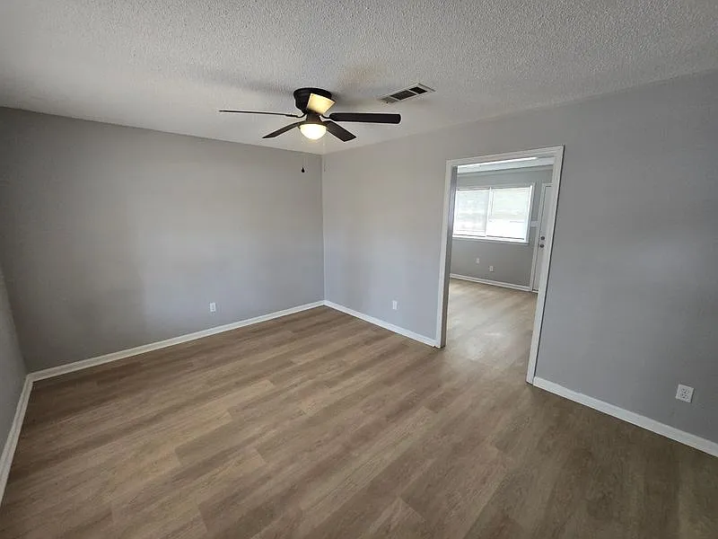 Charming 3-Bedroom Home with Attached Garage & Fenced Backyard — Photo 2