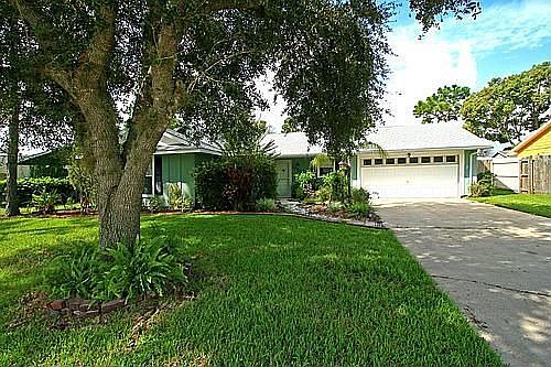 Picturesque setting with mature landscaping!