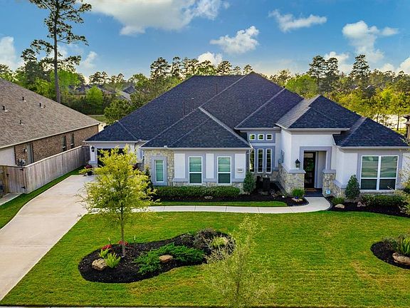 Drees Lauren II floor plan with 4 bedrooms and 4 1/2 baths all on 1/3 acre waterfront lot.