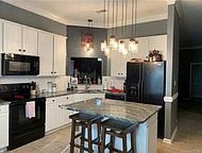 Granite Counters, Under mount lighting, Tile Backsplash