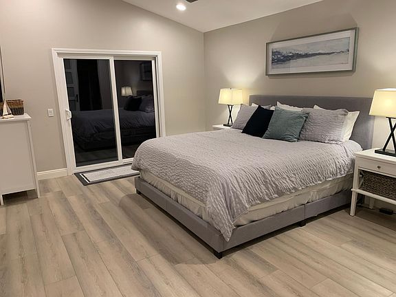 First Bedroom - King size adjustable-base bed & dresser