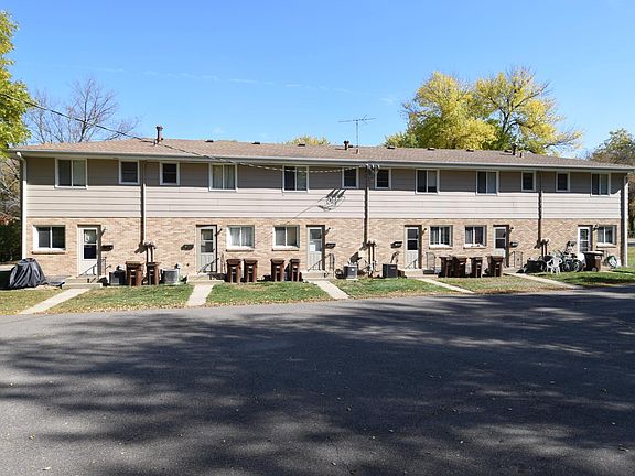 Back of building where parking is