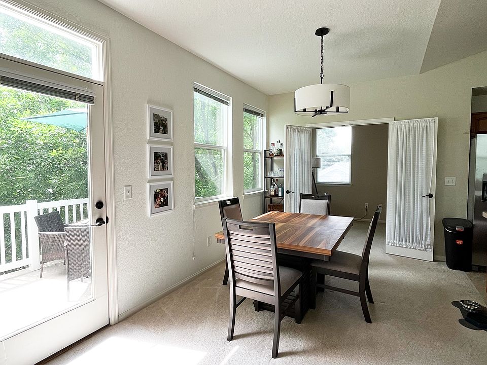 Dining area with door to second floor patio
