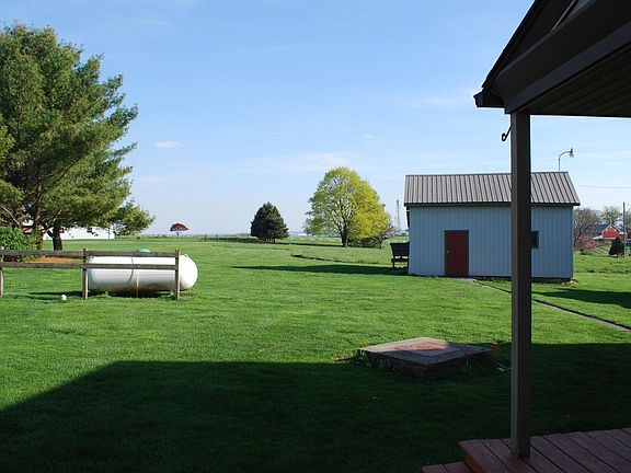 View of side yard - for tenant use & enjoyment. Landlord maintains lawn.