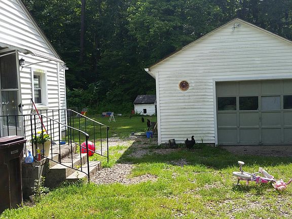 PANELED DETACHED GARAGE. WITH LOFT. THE CHICKENS LOVE THIS