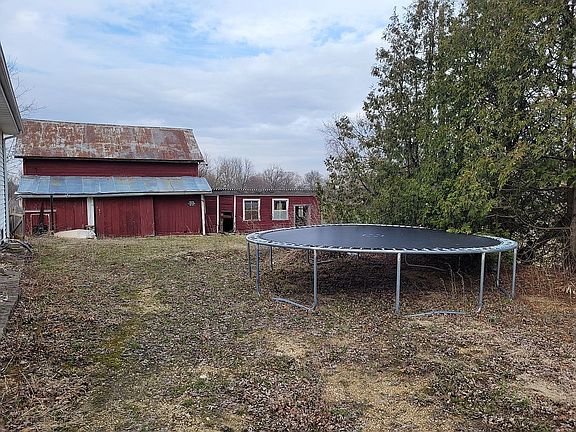 Side yard, trampoline stays 
