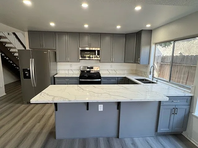 New kitchen with new stainless steel appliances