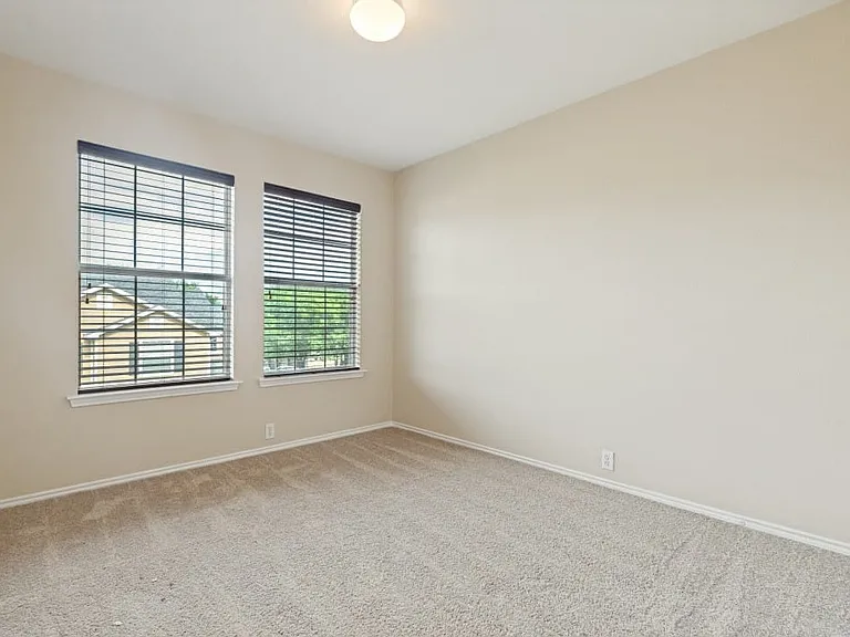 Upstairs front facing bedroom.