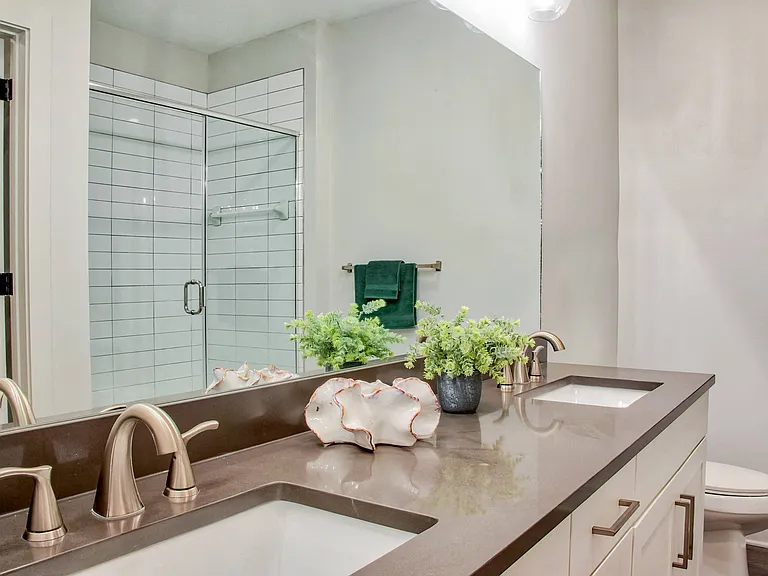 Modern and elegant finishes - double vanity in select units