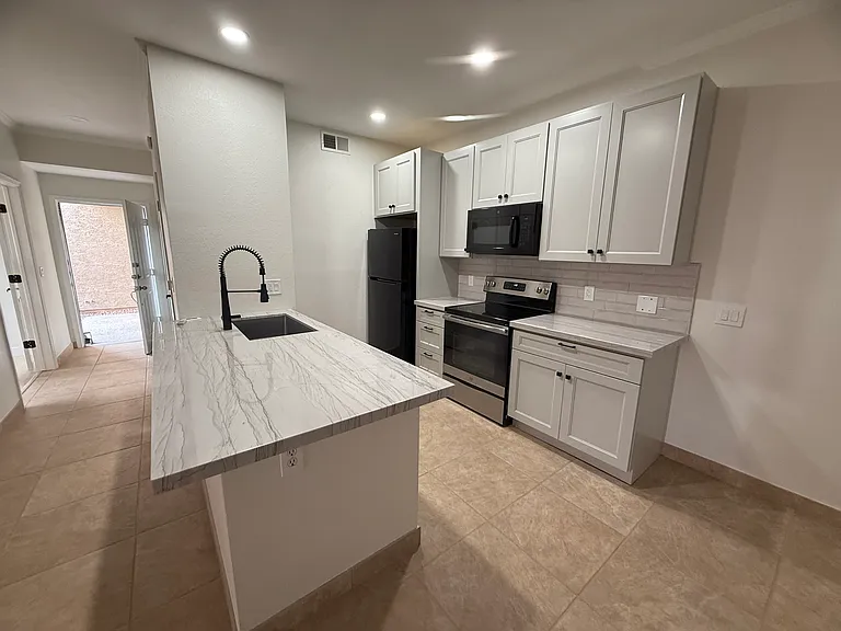 Kitchen viewed from dining area.