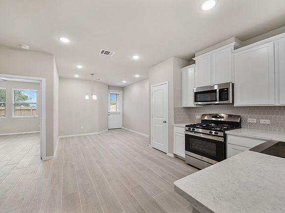 Abundant cabinet and counterspace